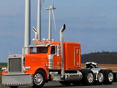 1/64 DCP ORANGE PETERBILT 389 TRI AXLE W/ 63