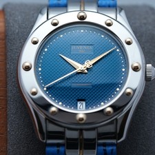 Reloj Unisex Juvenia Planet 32x37mm Acero y Oro Amarillo 18k Cabujones