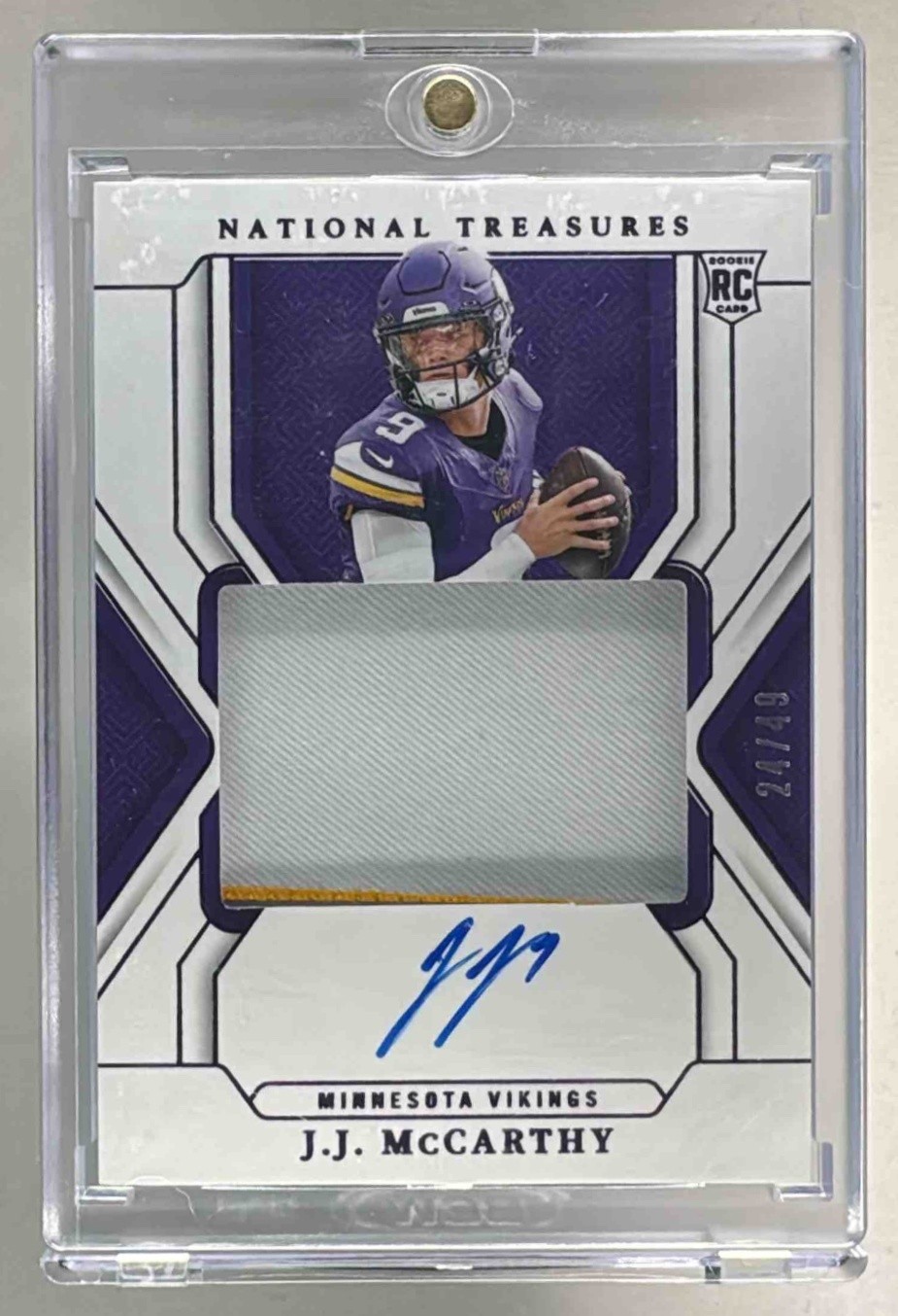 J.J. McCarthy 2024 National Treasures #156 Purple True Rookie Patch Auto RC /49