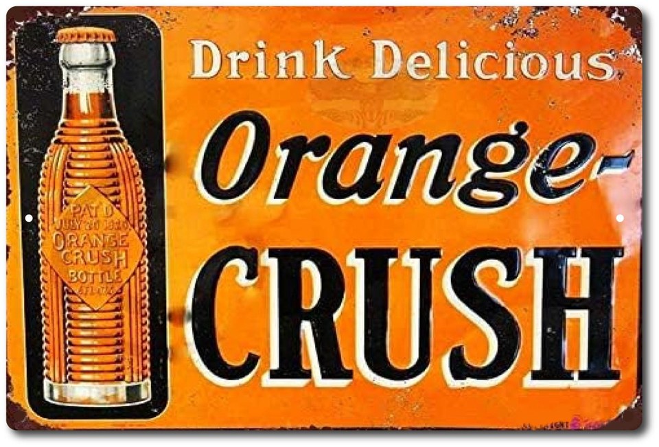 Genuine-looking 1950s-style Orange Crush aluminum sign with that classic soda fountain nostalgia — instant retro diner wall cred.