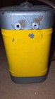 Vintage yellow JUSTRITE Flashlight Lantern No. 1958 with black casing, visible yellow logo text, and two metal mounting holes.