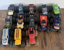 Mixed lot of 13 monster jam trucks hot wheels dirty needs cleaning