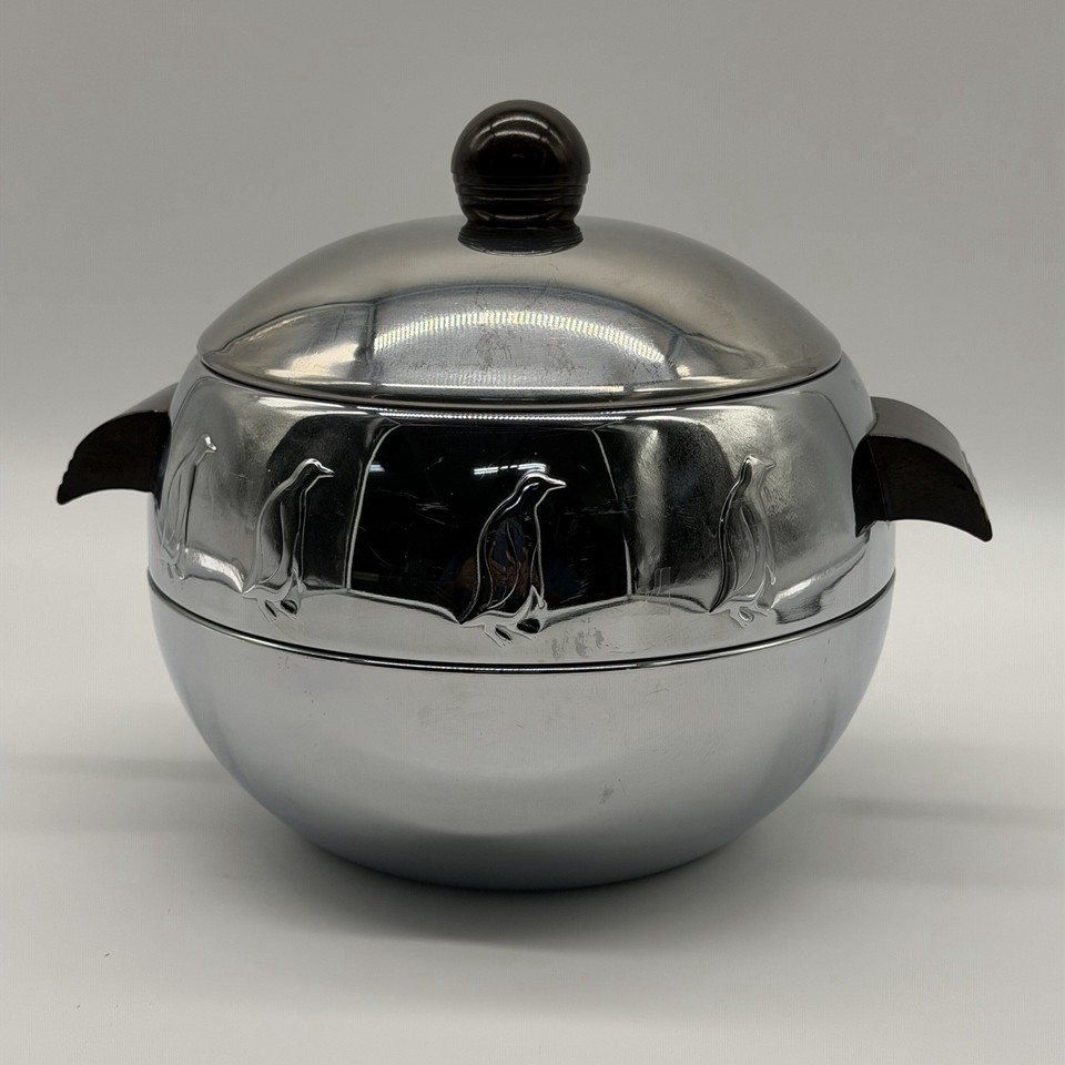 The iconic West Bend Penguin server with Bakelite fittings — a mid-century design classic that's been in cocktail books.