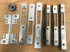 Genuine Adams Rite  accessories faceplates and strikers . Locksmiths Bargain