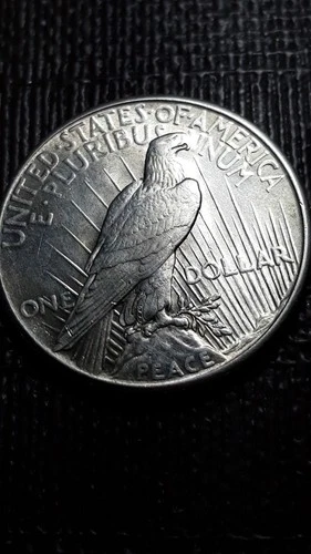 1925  Peace Silver Dollar    SM-70 C    (I don't collect them--Good Luck)