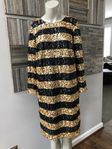 black and gold shift dress