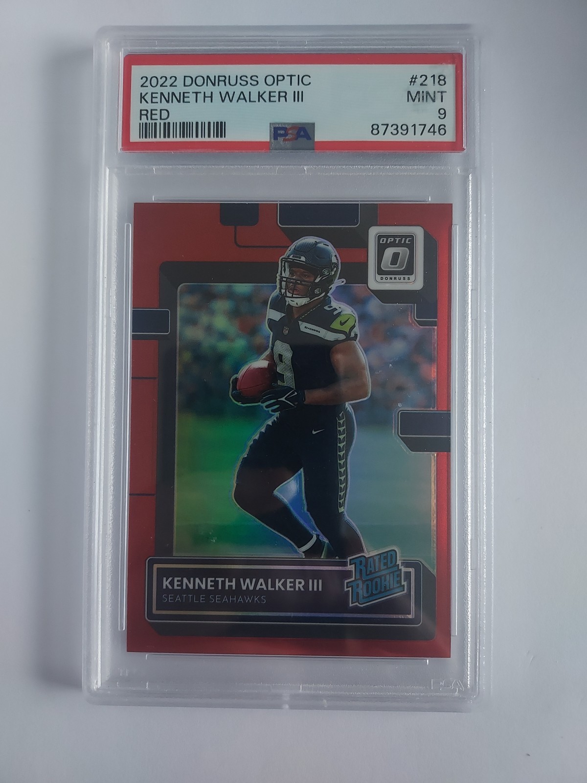 2022 Optic - Rated Rookie Kenneth Walker III #218 Red Prizm 28/99 (RC)