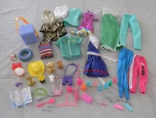 Good Sized Lot of Barbie Clothes Plus Household and Outdoor Accessories