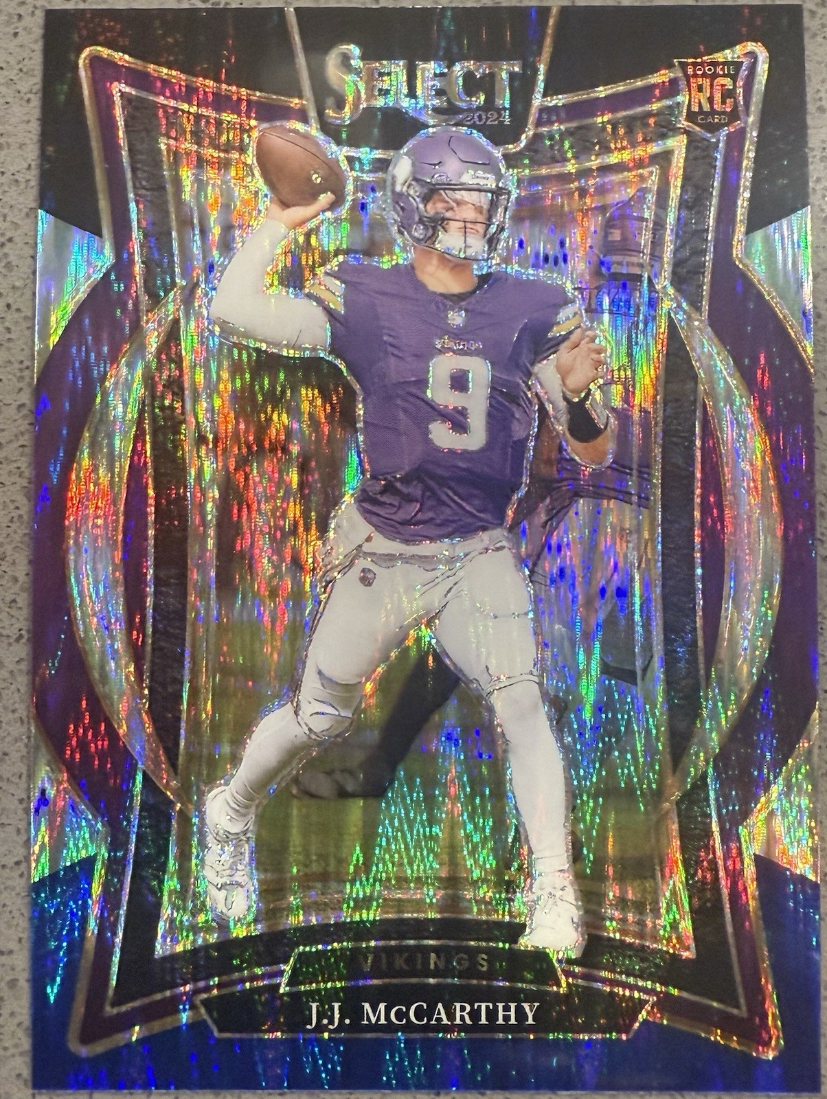 2024 Panini Select - Concourse J.J. McCarthy #24 Black & Blue Shock Prizm (RC)