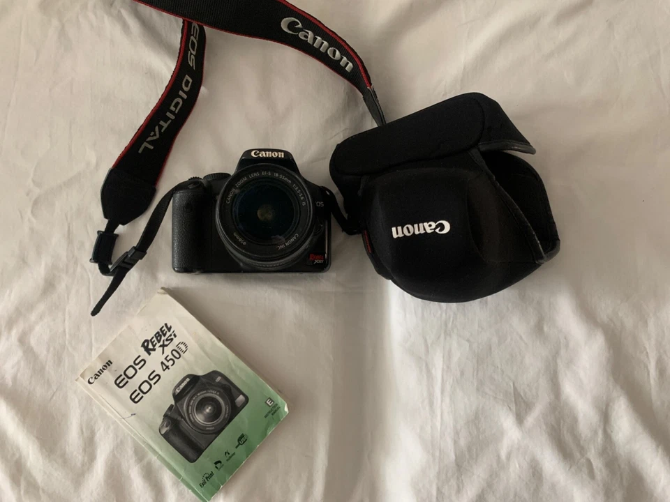 Cámara digital Canon rebel EOS xsi 450D, con estuche y lente zoom Quantaray AF Foto 2 de 4