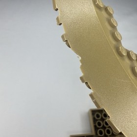 LEGO Brick Round Corner 10 x 10 w. Slope 33 Edge Axle Hole (x2) Dark Tan 58846