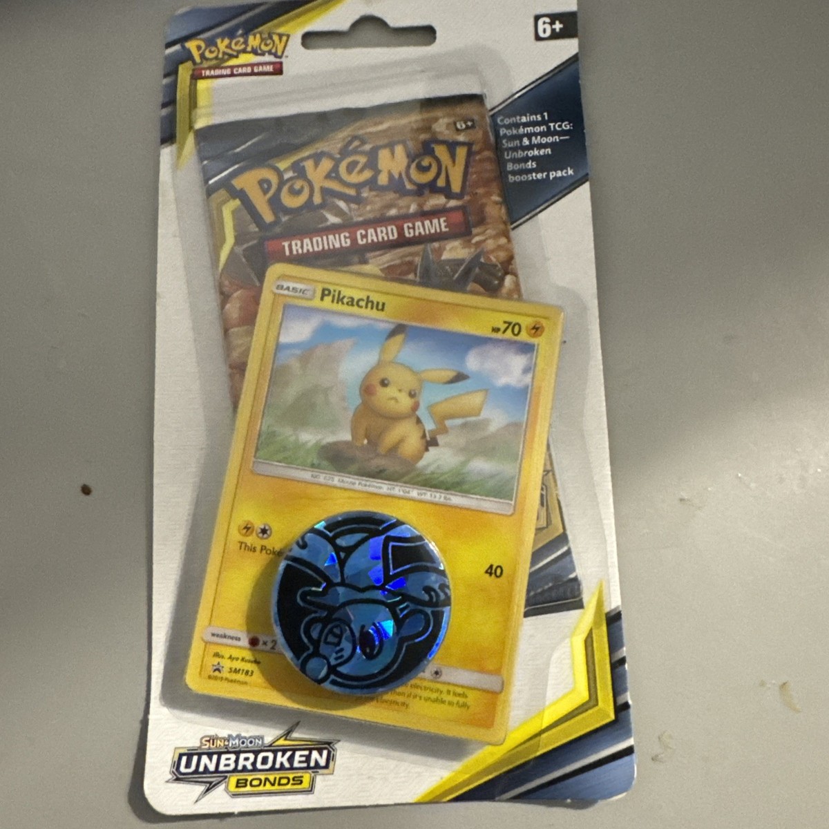 Pokmon TCG Sun & MoonUnbroken Bonds Checklane Blister PK featuring Pikachu
