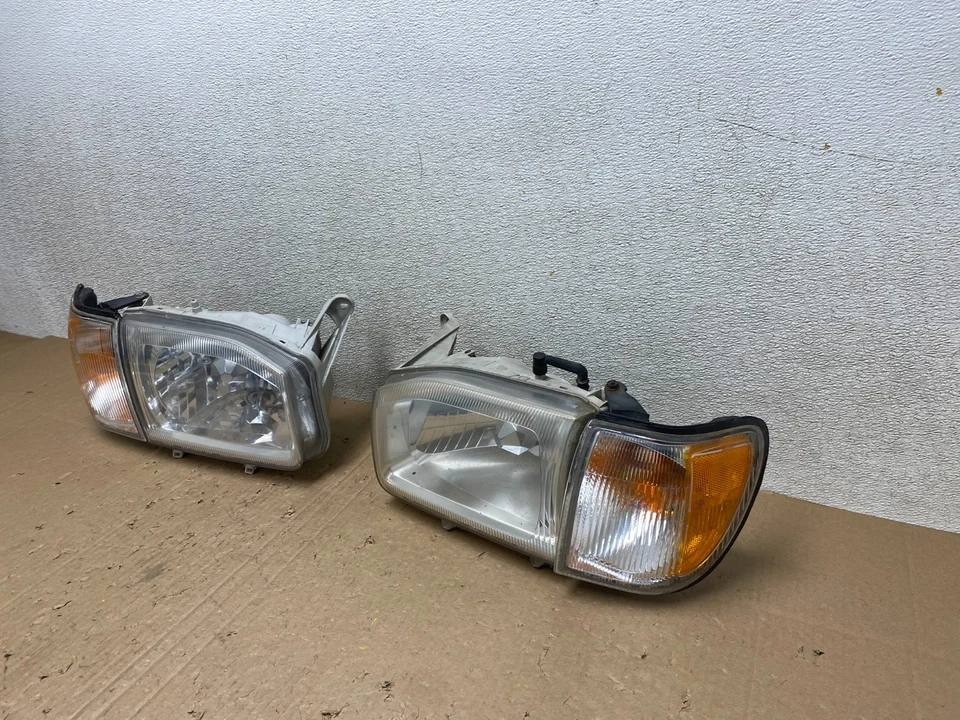 Juego de faros halógenos laterales izquierdo+derecho Nissan Pathfinder 1999-2004 OEM U0367 DW Foto 2 de 4