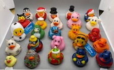 25 - assorted themes and sizes of rubber ducks