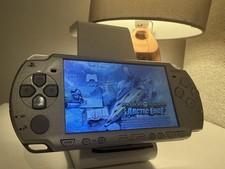 Sony PSP 2003 Silver Handheld System PAL No Battery No Charger