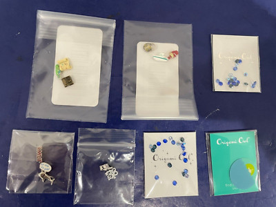 11 NEW ORIGAMI OWL CHARMS + 2 PACKETS OF CRYSTALS + CLOTH IN ORIGINAL PACKAGING