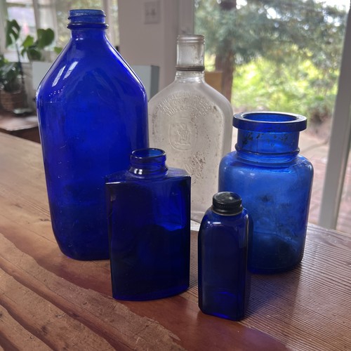 VINTAGE COBALT BLUE GLASS BOTTLES - Vicks (?), Bourjois, H & A Gilley, Phillips