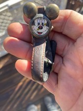 vintage Mickey Mouse watch with original band. Needs TLC. brass