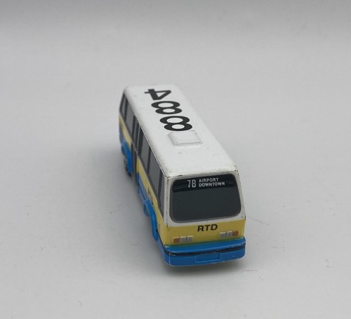 De colección Micro Machines Galoob 1989 City Bus RTD Aeropuerto Centro Amarillo Azul Blanco - Imagen 3 de 6