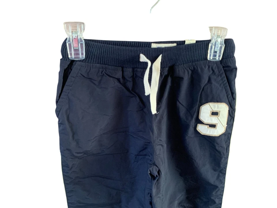 Pantalones deportivos a rayas azules blancos talla 10 The Childrens Place para niños Track Jogger Nylo Foto 2 de 4