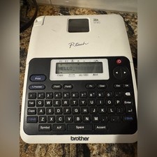 Brother P-touch Electronic Label Maker tested works. Batteries is not included.