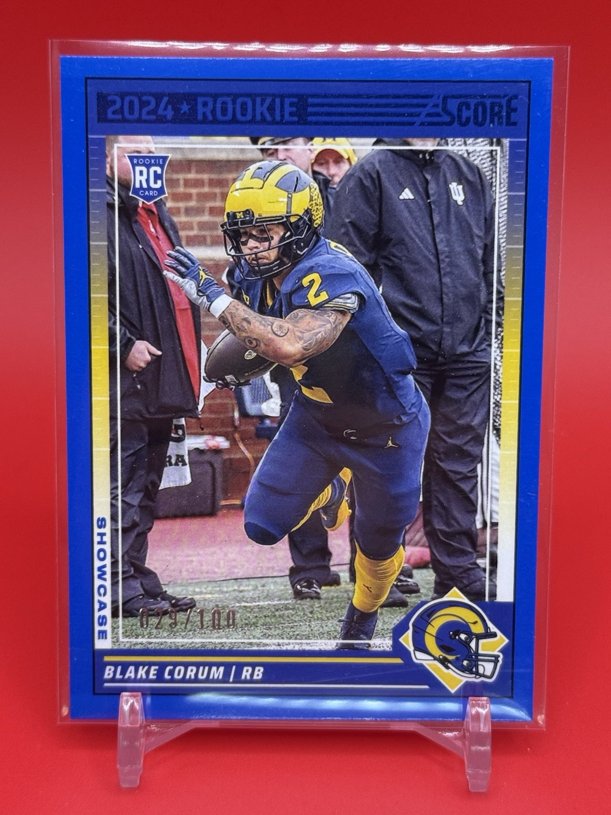 Blake Corum 2024 Panini Score Football Rookie Showcase RC /100 #389 Rams