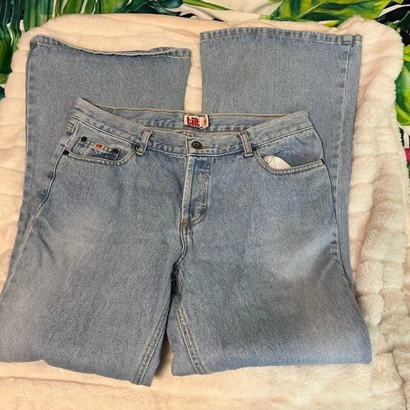 Pantalones de mezclilla acampanados con botones de lavado claro inclinados vintage para jóvenes 11 Foto 4 de 4