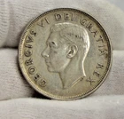 1951 Canada AU Silver Dollar $1