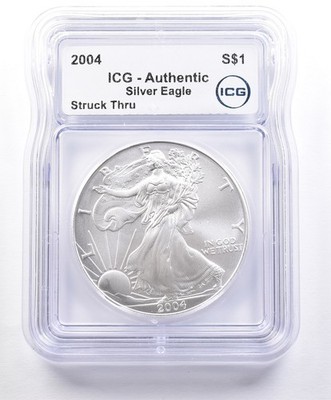 ERROR 2004 American Silver Eagle Struck Thru ICG *2356 | eBay