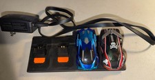 2 Anki Overdrive Cars Ground Shock Skull Supercars With Charger - Untested