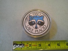 RARE HAND SIGNED MIKE ERUZIONE 1980 OLYMPIC LAKE PLACID HOCKEY PUCK RACCOON LOGO