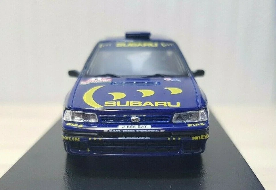 Modelo de coche fundido a presión 1/64 Kyosho SUBARU LEGACY RS RALLY #8  Foto 2 de 4