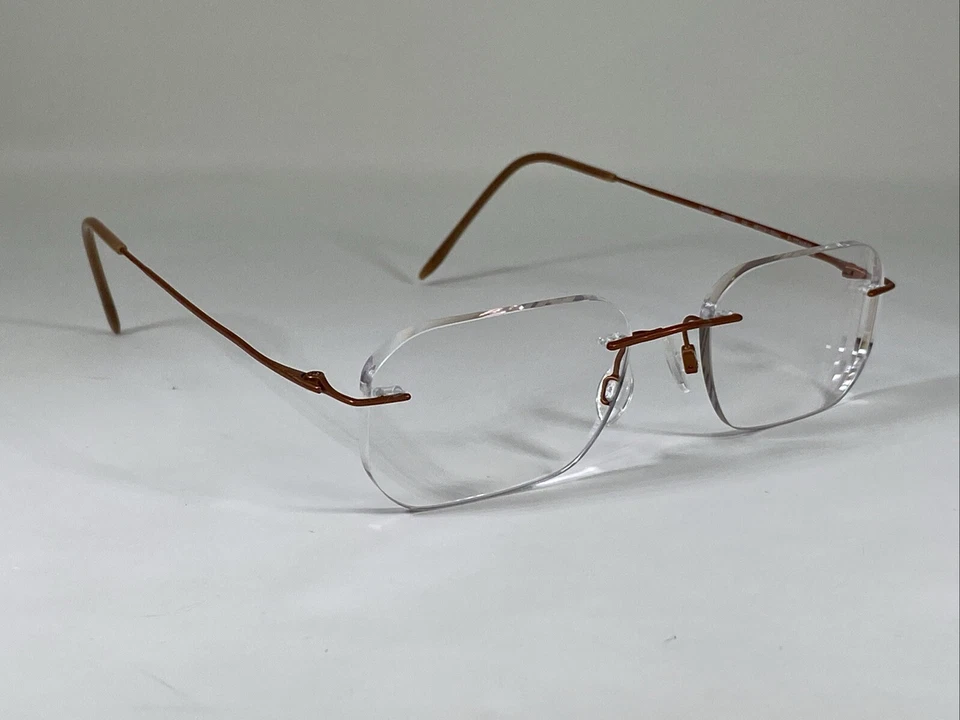 Marco de gafas CHARMANT CH8600 titanio naranja sin montura 19-140 mm  Foto 3 de 4