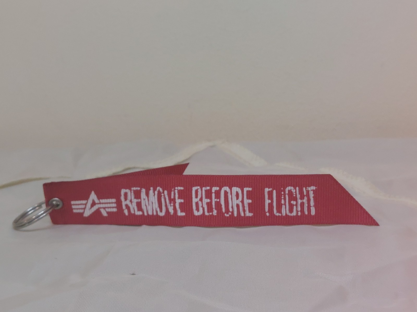 Alpha Industries Remove Before Flight Red Tag Rib… - image 1