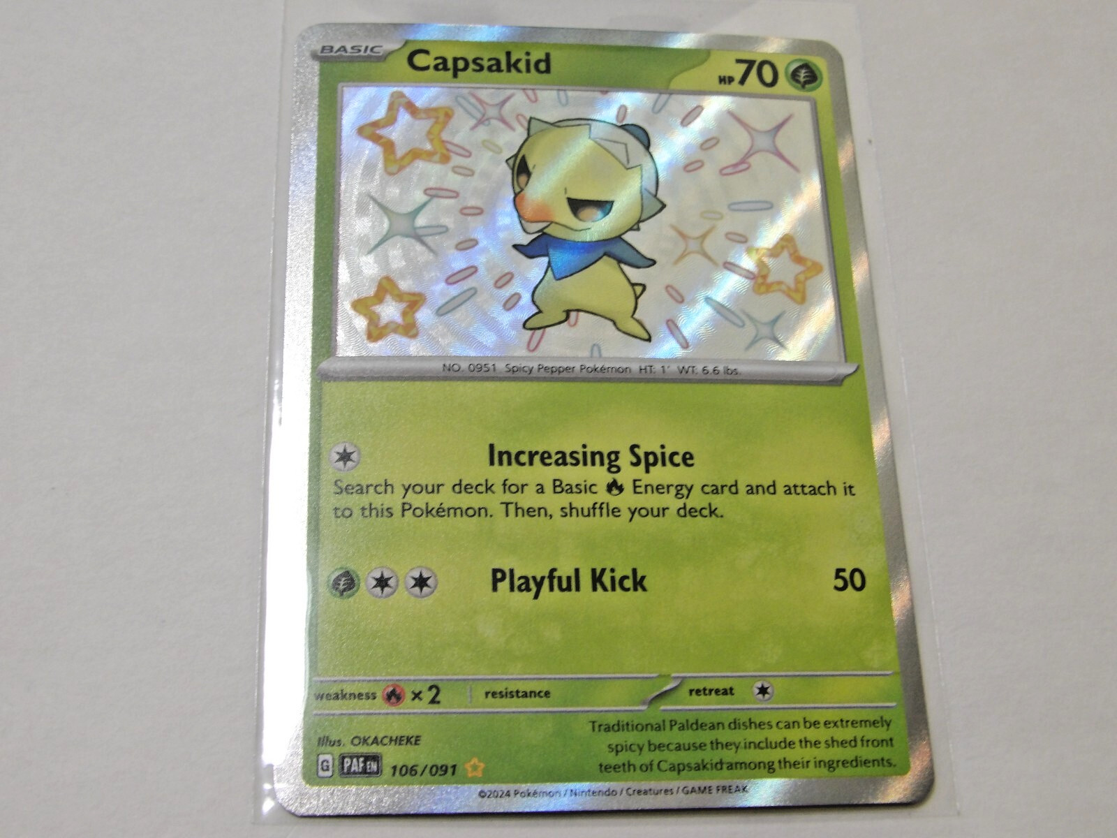 Pokemon Paldean Fates Capsakid #106/091 NM