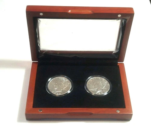 PEACE SILVER DOLLARS Pair of Coins Encased in Brilliant Uncirculated Condition
