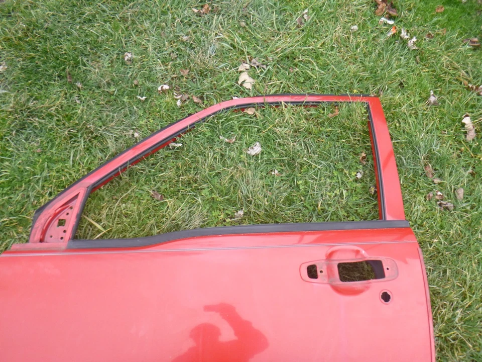 Chevrolet Tracker 2002 puerta delantera lado del conductor delantero izquierdo rojo Foto 2 de 4