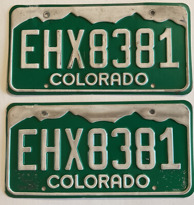 Vintage Pair (2) Colorado ￼license plate EHX 8381 Ford Chevy Dodge embossed.