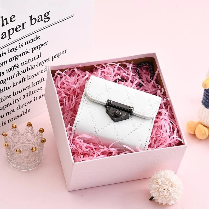 Caja de regalo de papel triturado de rafia colorida de 100 g relleno hágalo usted mismo embalaje decoración Foto 2 de 4