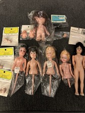 DOLL PART LOT NEW IN PACKAGE B2 