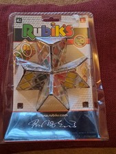 RUBIKS 40º ANIVERSARIO 2014 ANILLOS MÁGICOS ROMPECABEZAS EN MUY BUENA CONDICIÓN CON EMBALAJE