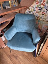 Teal Velvet Occasional Chair with Black metal Legs.