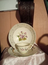curated 4‑piece mismatched floral china set