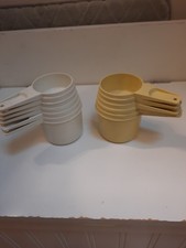 Tupperware 6 piece and 5 piece measuring cups (2 sets) yellow and cream nesting