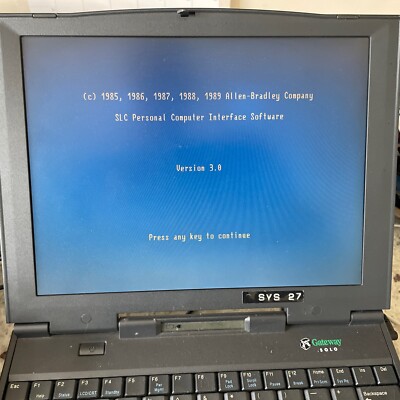 DOS Laptop With Allen Bradley PCIS Software. W/ Program Cable And memory Module