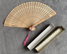 Vintage pierced wooden fan. 13 x 8 when open. Original storage box.