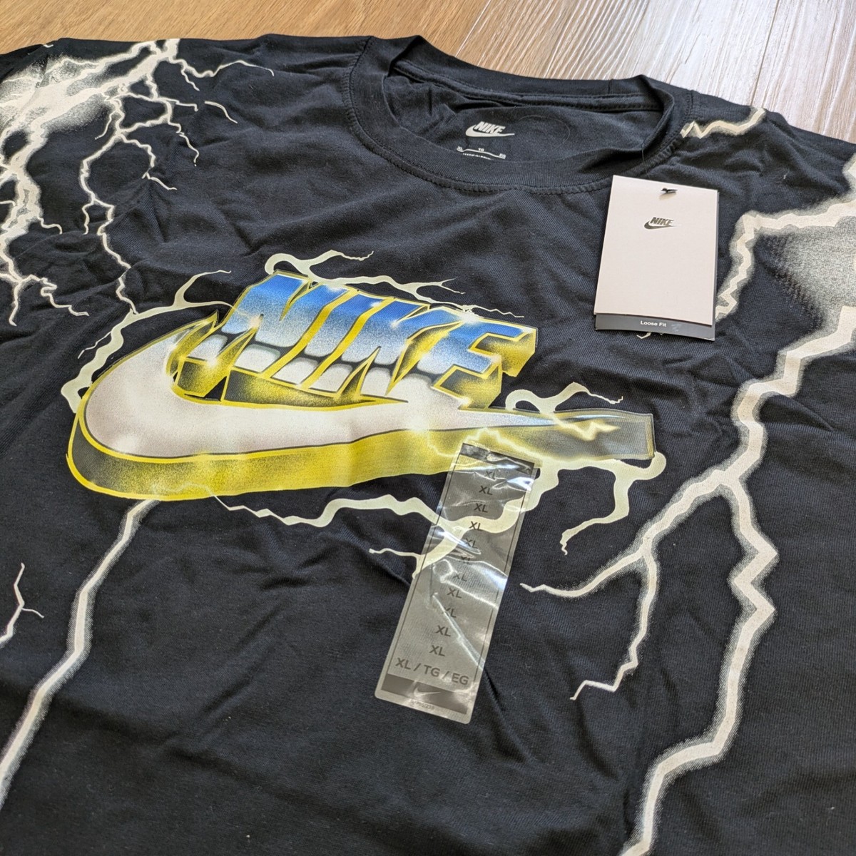 Nike Ma World Order T-Shirt Black Bold Lightning Logo DZ3056 Nike Ma World Order T-Shirt Black Bold Lightning Logo DZ3056