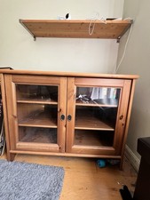Tv cabinet Wooden with lockable glazed doors.