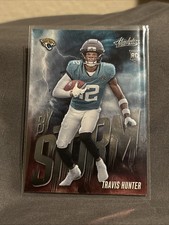 2025 Absolute Football - Travis Hunter - By Storm - Jaguars - RC - #17