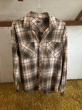 Brown and cream plaid flannel shirt